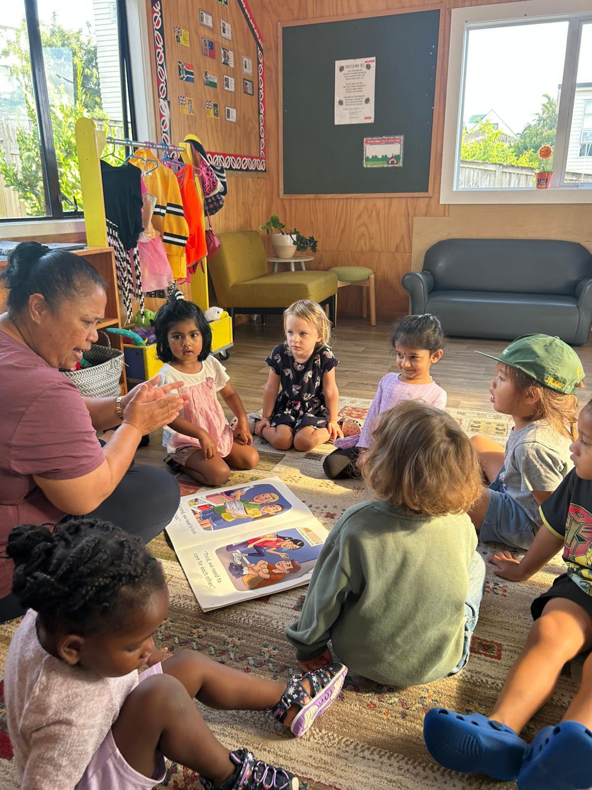 Child exploring nature at Little Village Preschool